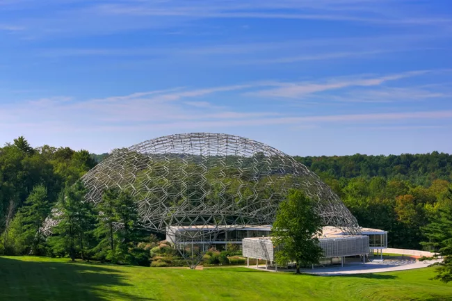 An R. Buckminster Fuller geodesic dome rises over a renovated and restored John Terence Kelly 1959 office building, home to ASM International, a member-led society for the materials science and engine
