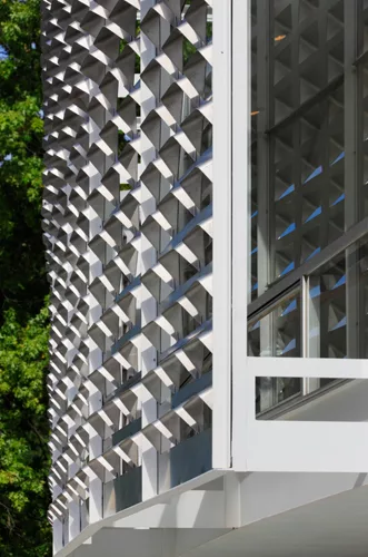 An R. Buckminster Fuller geodesic dome rises over a renovated and restored John Terence Kelly 1959 office building, home to ASM International, a member-led society for the materials science and engine