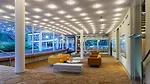 An R. Buckminster Fuller geodesic dome rises over a renovated and restored John Terence Kelly 1959 office building, home to ASM International, a member-led society for the materials science and engine