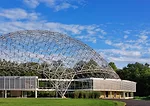 An R. Buckminster Fuller geodesic dome rises over a renovated and restored John Terence Kelly 1959 office building, home to ASM International, a member-led society for the materials science and engine