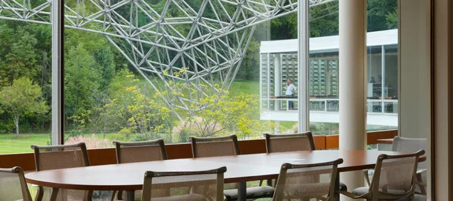 An R. Buckminster Fuller geodesic dome rises over a renovated and restored John Terence Kelly 1959 office building, home to ASM International, a member-led society for the materials science and engine