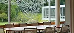 An R. Buckminster Fuller geodesic dome rises over a renovated and restored John Terence Kelly 1959 office building, home to ASM International, a member-led society for the materials science and engine