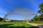 An R. Buckminster Fuller geodesic dome rises over a renovated and restored John Terence Kelly 1959 office building, home to ASM International, a member-led society for the materials science and engine