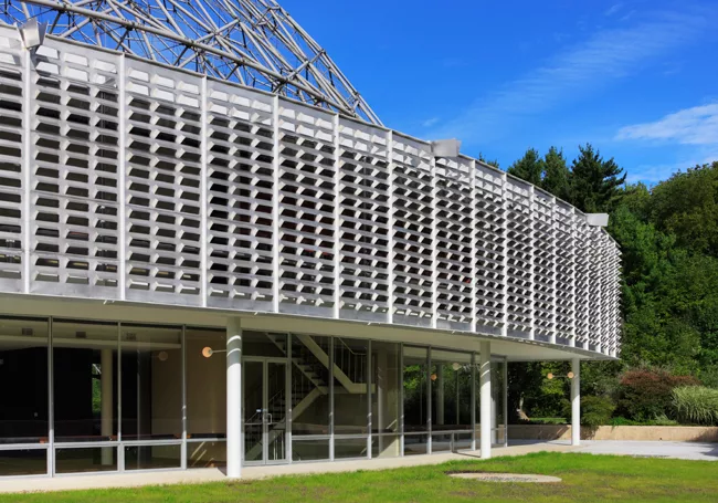 An R. Buckminster Fuller geodesic dome rises over a renovated and restored John Terence Kelly 1959 office building, home to ASM International, a member-led society for the materials science and engine
