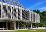 An R. Buckminster Fuller geodesic dome rises over a renovated and restored John Terence Kelly 1959 office building, home to ASM International, a member-led society for the materials science and engine