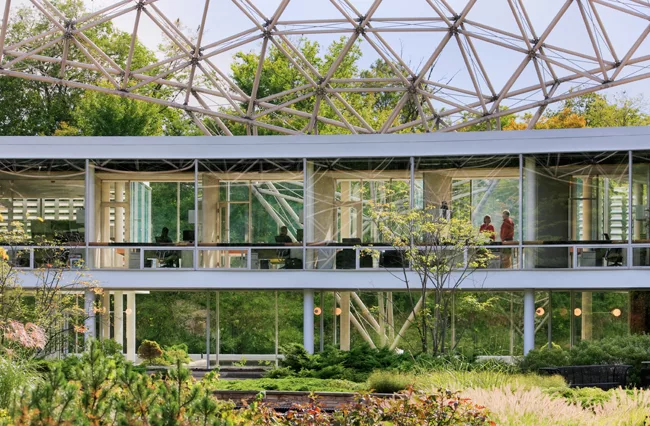 An R. Buckminster Fuller geodesic dome rises over a renovated and restored John Terence Kelly 1959 office building, home to ASM International, a member-led society for the materials science and engine