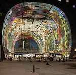 A cable net facade provides transparency as well as protection from the elements. During heavy storms, the architects say, the facade can flex more than two feet inwards.