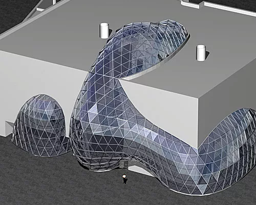The atrium climbs up the wall of the museum and terminates on the roof, creating a skylight over a grand spiral stair.
