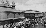 The building, known locally as the March' Hyppolite, served as a vital retail hub for more than a century. The building comprises two 20,000-square-foot halls. Rising 35 feet at their highest points, 