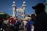 The clock tower's unstable legs were mostly rebuilt with steel, yet its top portion was carefully refurbished by Haitian craftsmen.