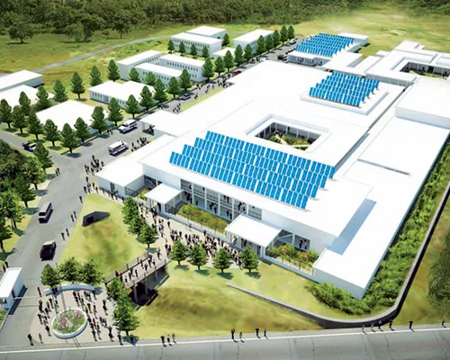 Haitian workers are learning U.S.-style construction, tempered by budget and supply-chain realities. The design, donated by Nicholas Clark Architects, uses natural ventilation and solar power to count