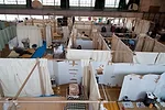 Emergency centers set up in gymnasiums and other large structures offer little privacy.  In response, Shigeru Ban conceived a partition system made of paper tubes and canvas sheets. 