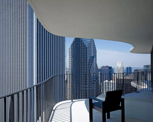 Aqua Tower's concrete terraces, with their overhangs, bring to mind the ancient cliff dwellings of Mesa Verde'Gang's first memory of architecture.