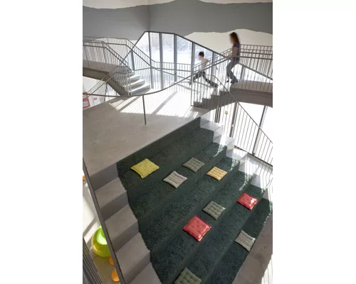 SOS Children's Village Lavezzorio Community Center delights through stairs as stadium seating and circulation.