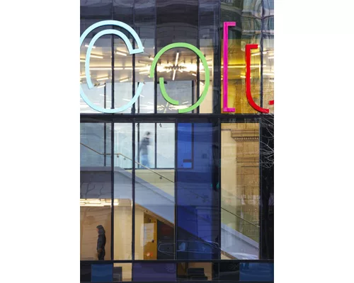 Chicago's Columbia College Media Production Center beckons through transparency and flashes of color.