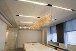 For his recent show at Gensler, Adrift/Afloat, Stephen Talasnik designed four site-specific sculptures, including two skeletal, serpentine forms that hover over separate conference tables. 