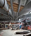 The roof's steel arches curve in two directions, as evident when standing on the construction platform of the PATH mezzanine looking north. 