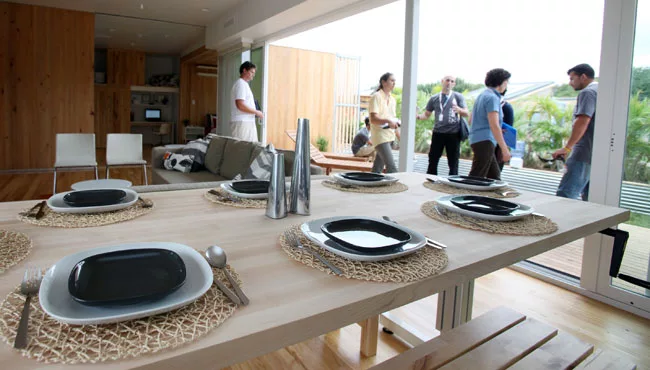 Visitors explore the interior of Team Florida's house. 
