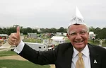 Kenneth Peacock, chancellor of Appalachian State University, shows his enthusiasm during the opening ceremony on September 22. 