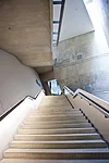 A broad interior staircase leads to the top-tier galleries, with a view over Dresden looking to where the first flares landed to launch the firestorm that consumed the city in February 1945.