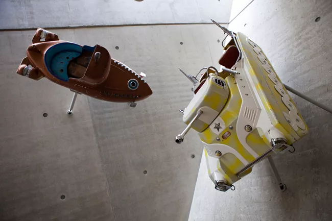 An exhibition on war toys climbs the interior walls.