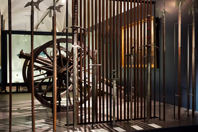 A traditional cannon and sword mark the west wing of the museum.