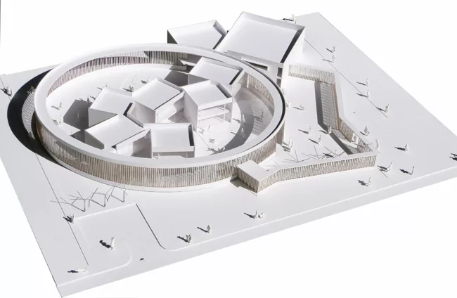 Presentation model for El Porvenir kindergarten, made of white cardboard.