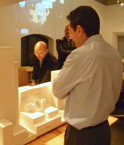SFMOMA director Neal Benezra watches as Sn'hetta principal Craig Dykers presents a model of the project at the firm's New York office.