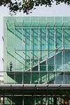 Fire stairs adorn the green facades.