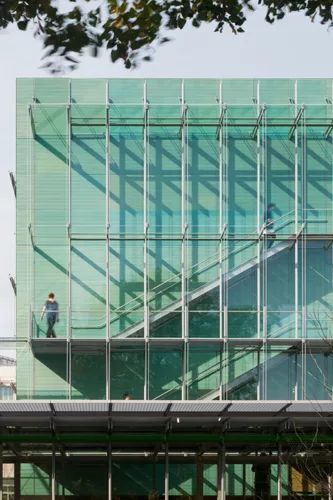 Fire stairs adorn the green facades.