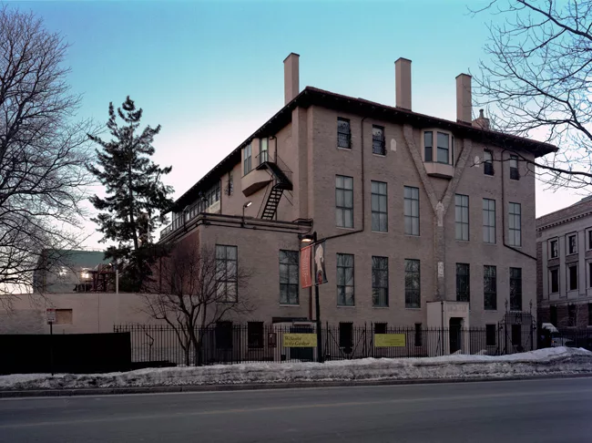 The original 1903 building’s entrance faces the Fenway.
