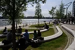 The Dalmannkai Steps have four planted levels inclining down towards the harbor basin of Grasbrookhafen.