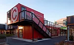 Re:START is constructed of colorful, stacked shipping containers.
