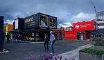 Re:START is constructed of colorful, stacked shipping containers.