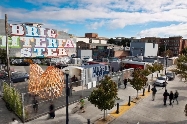 Leasing an empty site from the city, San Francisco firm Envelope a+d's <em>Proxy </em>redeveloped two large lots to become a kind of urban living room, with food stands, a temporary art gallery, a bee