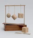 <em>Froebel Gift No. 2: Sphere, Cylinder, and Cube</em>, c. 1890