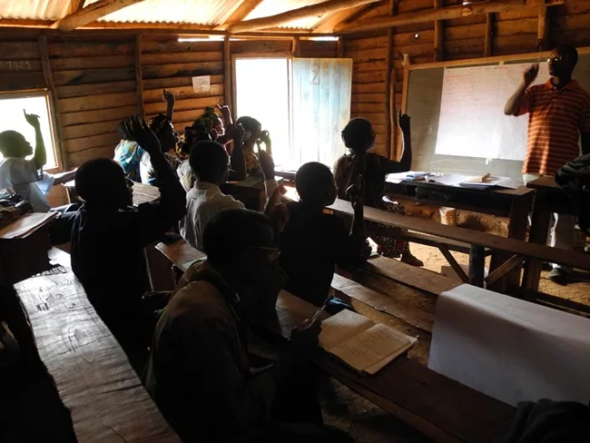 <p><strong>Tuungane Health Center</strong></p><p class='MsoNormal'>Through the International Rescue Committee's Tuungane program in the Democratic Republic of the Congo, communities hold meetings to v