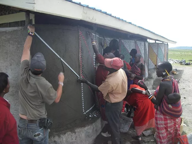 <p><strong>Loita Learning Center</strong></p><p>Over 70,000 bottle caps were collected throughout the U.S. and Africa and became the siding for the building as well as a monument to the Maasai culture