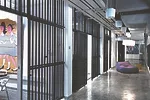 The justice building's original jail cells were preserved and now function as classrooms, studio space, and offices.