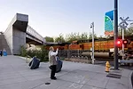 <p class='MsoNormal'>Olympic Sculpture Park from Broad Street, Seattle, showing freight train, bridge and Louise Bourgeois’s <em>Eye Benches</em> (1996-1997).</p>