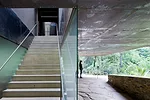 Outdoor terrace in the Miguel Rio Branco Pavilion at Inhotim, designed by Arquitetos Associados.