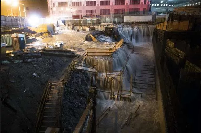 Photos of water rushing into the World Trade Center (WTC) construction site circulated on Twitter and Facebook on Monday night. According to some news accounts, the water was as deep as 30 feet. Contr