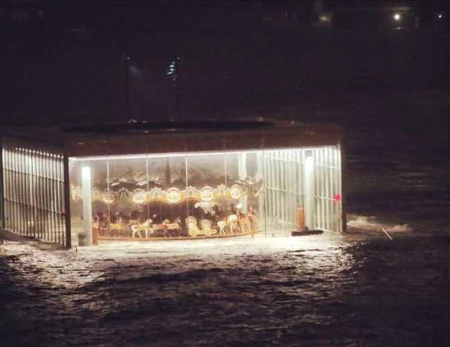 Rising water from the East River surrounded the Jean Nouvel-designed pavilion that houses Jane's Carousel in Brooklyn Bridge Park (which was designed by Michael van Valkenburgh Associates). As of toda