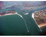 MOSE is a flood barrier under construction, which is intended to protect Venice, Italy. The barrier consists of a series of gates, which, once completed, will close off the three entrances to the Veni