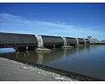 The Eider Barrage is located at the mouth of the Eider River on Germany’s North Sea coast. It is a reinforced concrete structure 790 feet long, consisting of a vehicular tunnel, flanked on both 