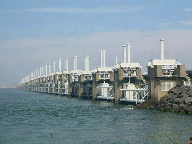 The Oosterscheldekering (Eastern Scheldt Storm Surge Barrier) is the largest of 13 structures making up the Delta Works that protect southern Holland. The Delta Works were initiated in response to th
