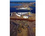 The St. Petersburg Flood Prevention Facility Complex protects St.  Petersburg, Russia, a city of 4.8 million residents. The barrier consists of an embankment across the Neva River estuary,  topped by 