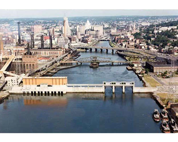 The Fox Point Hurricane Barrier protects Providence, Rhode Island, which is located at the head of Narragansett Bay. It consists of two 800-foot-long rockfill wing dikes that extend from either end of