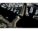 The Stamford Hurricane Barrier protects Stamford, Connecticut. It consists of 13,000 feet of earth and armor-stone embankments and concrete walls rising 17 feet above mean sea level, and a 35-foot-tal