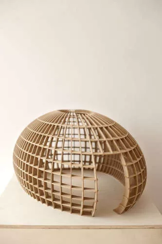 A prototype of 'Guiro' (15 3/4 x 39 3/8 x 26 inches), by Los Carpinteros. <br />